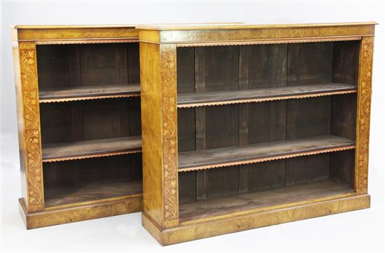 A pair of pollard oak and birds eye yew open bookcases, W.4ft 3.5in.